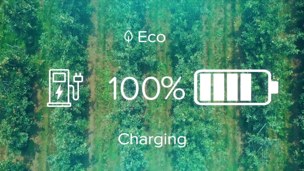 Drone hovering over orchard with Eco overlay starting at 9% rising and falling as team walking