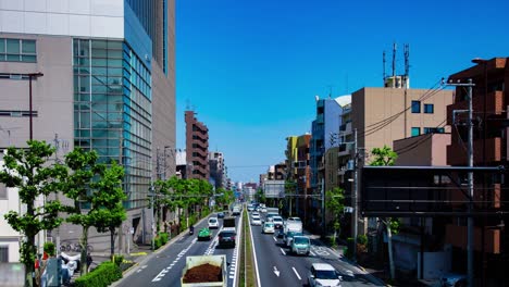 a timelapse of the traffic jam at the urban street in tokyo long shot