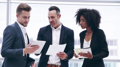 4k footage of three colleagues having a discussion