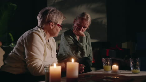 two women engaging in a tarot card reading