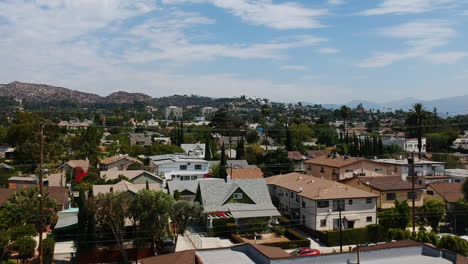 los feliz neighbourhood in la with houses, hills, trees and mountains