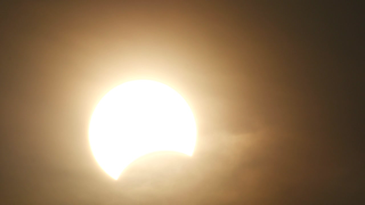 partly solar eclipse when sun rise
