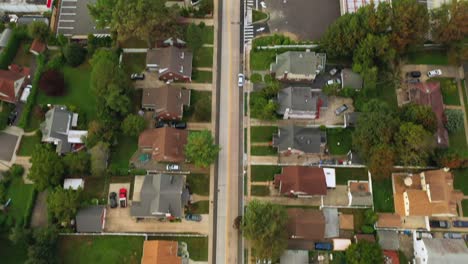 a top down view over a suburban neighborhood in the evening