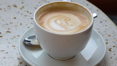 close-up of latte art in a coffee cup