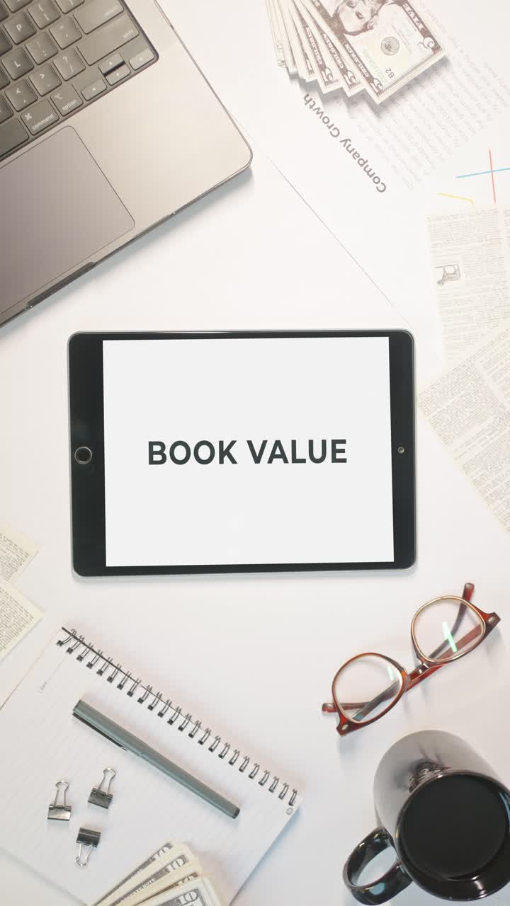VERTICAL VIDEO OF BOOK VALUE DISPLAYING ON A TABLET SCREEN