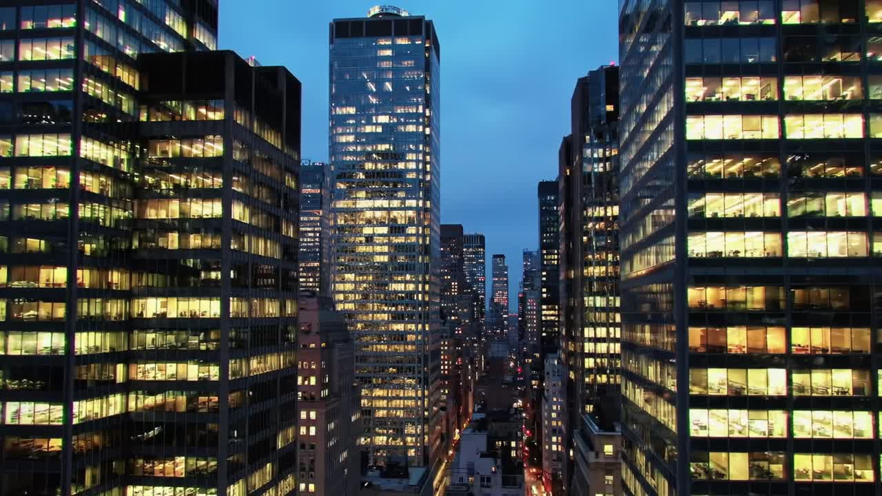 Stunning Evening Cityscape: A Vibrant Urban View Showcasing Skyscrapers Illuminated at Dusk, Capturing the Dynamic Energy of City Life