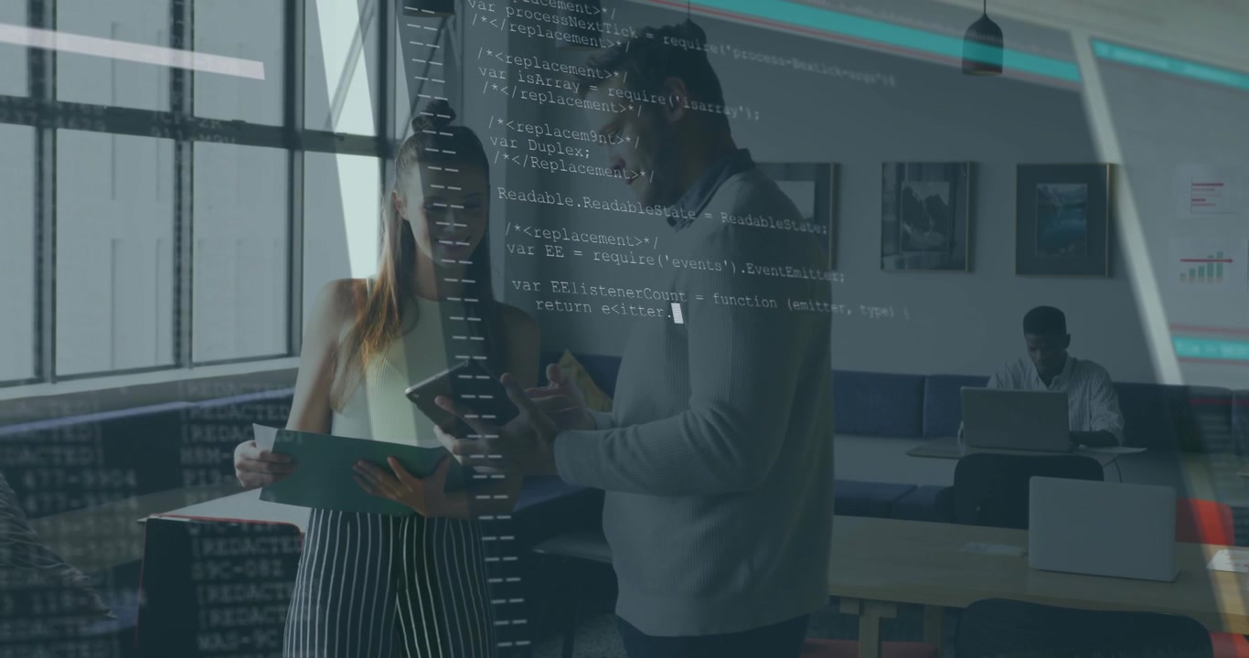 Two colleagues at table reviewing documents on tablet, JavaScript overlay appearing then retracting