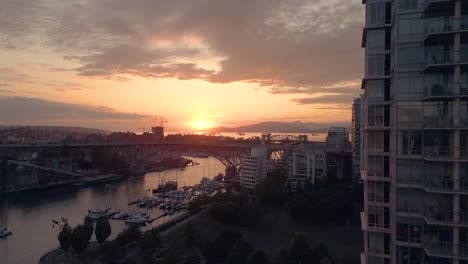 the sun setting over the vancouver waterfront