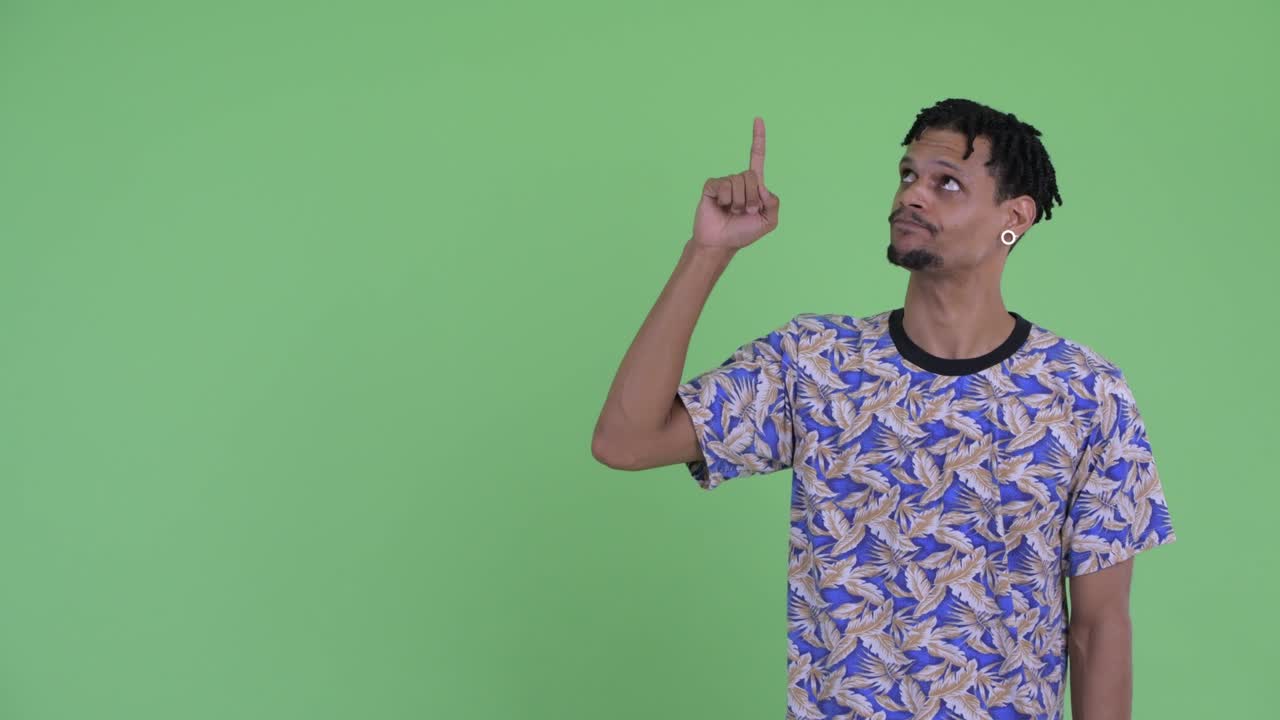 Young handsome African man with dreadlocks