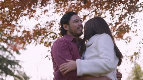 husband and wife meeting each other in a park in port coquitlam.