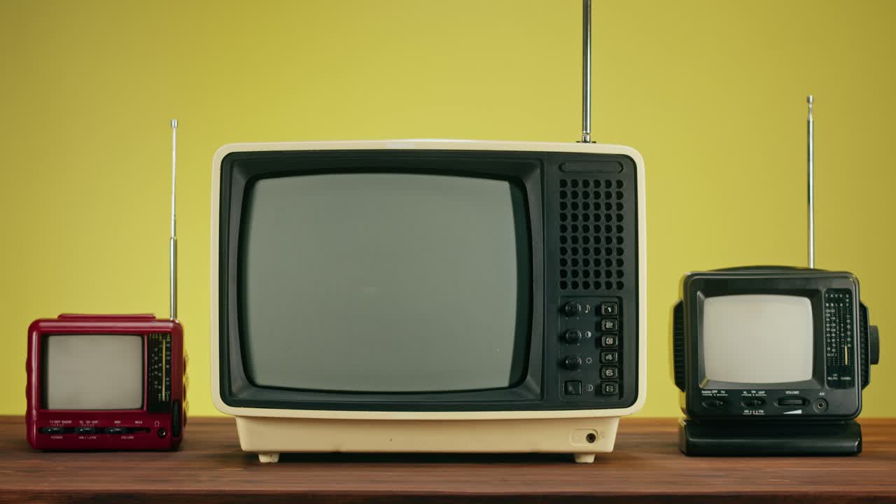 Three vintage televisions