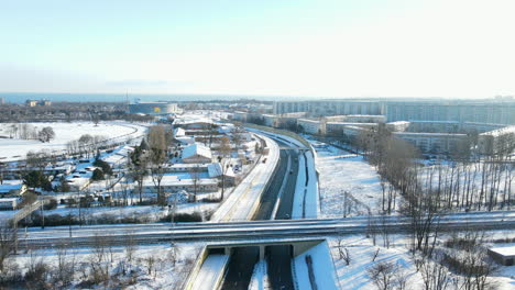 skyview of the road intersection in gdansk poland during winter - aerial shot