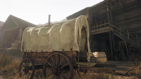 a covered wagon in a western town