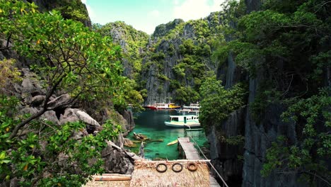 4k drone through narrow passage at twin lagoon, coron, palawan philippines