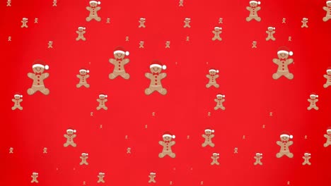 animación de hombres de pan de jengibre cayendo sobre un fondo rojo