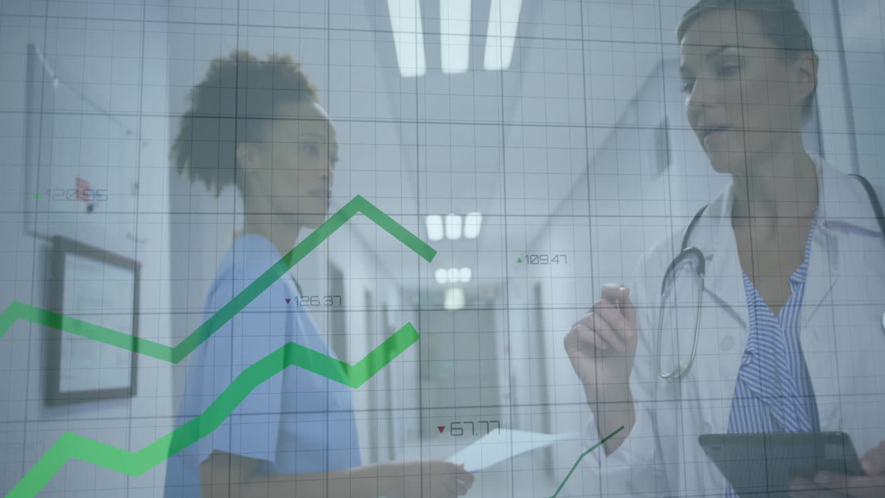 Doctor and nurse analyzing tablet in medical corridor with animated trend line chart overlay