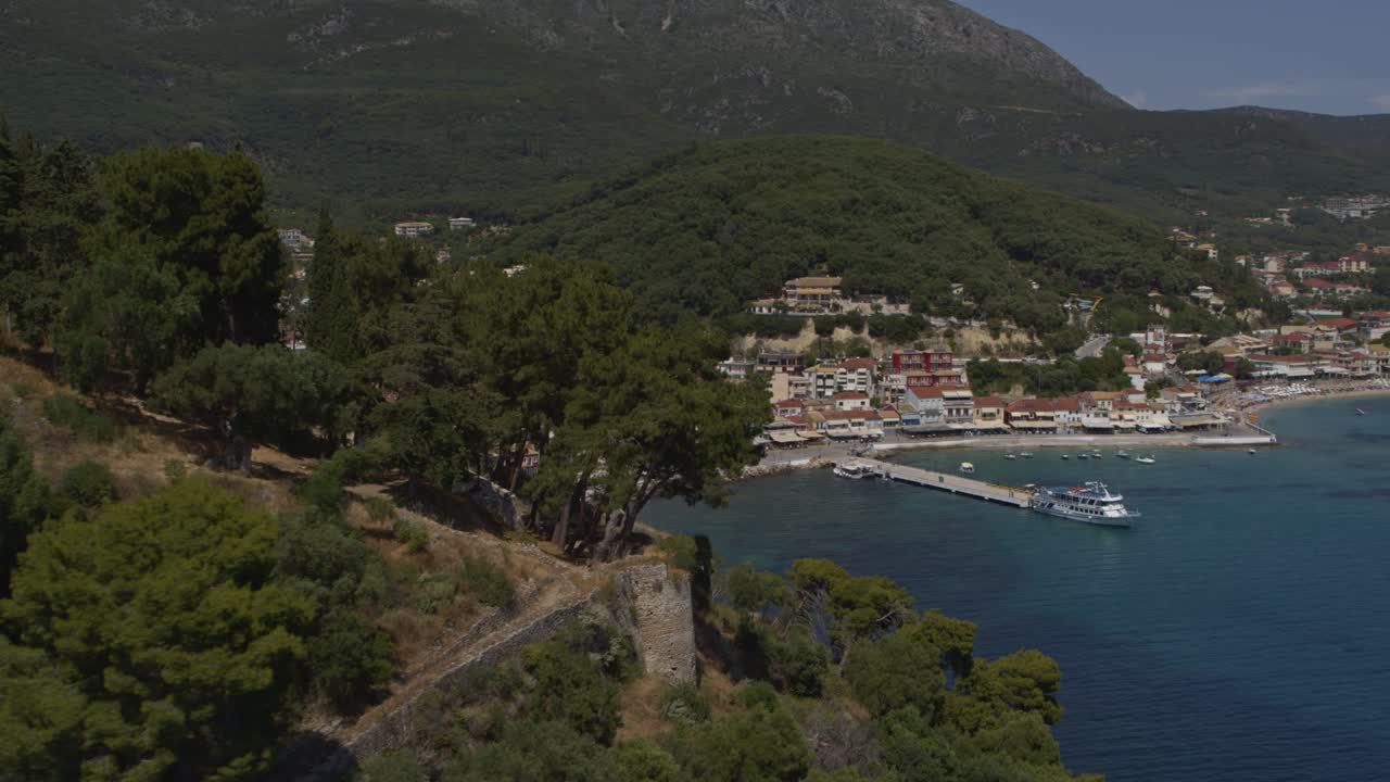 Aerial - Reveal of Parga behind its castle - Shot on DJI Inspire 2 X7 RAW