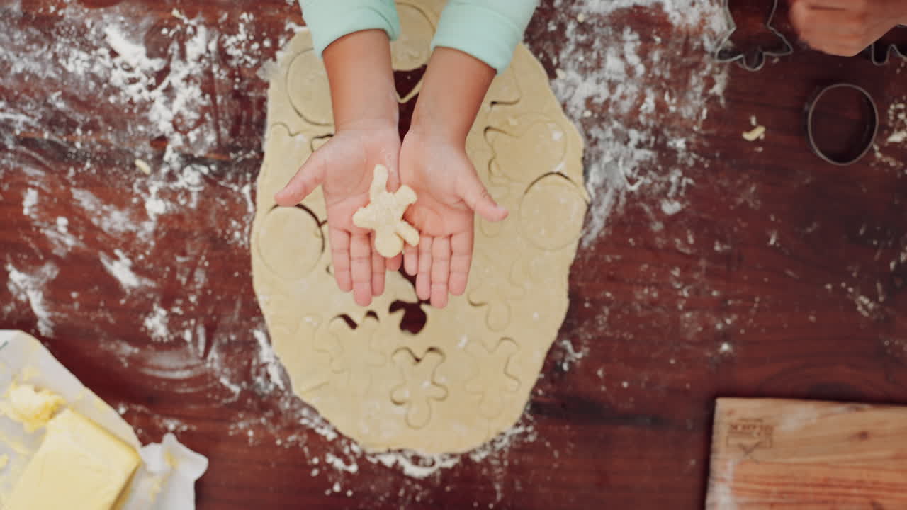 Hands, baking and kid with shape in top view
