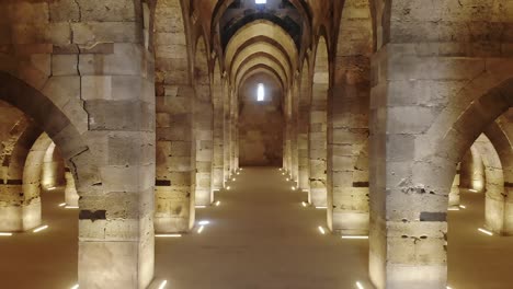 interior of historical monumental building with stone arches and domes