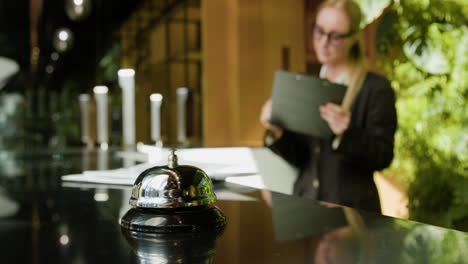 Close-up-view-of-reception-bell-on-a-counter