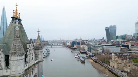 Truck-left-shot-of-the-highest-part-of-the-Tower-Bridge-in-London,-during-the-day