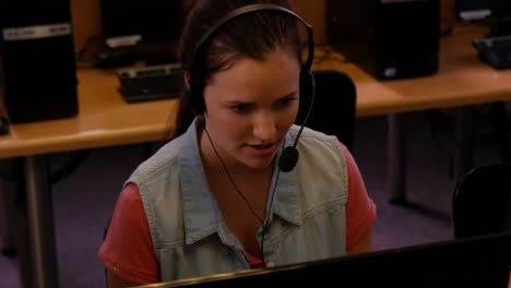 student using computers in the computer room