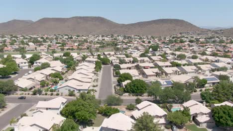 rising aerial shot of arizona's never ending neighborhoods for retired folks