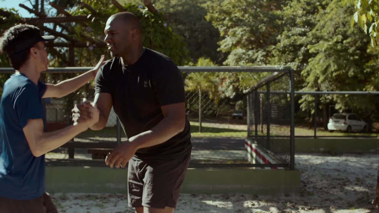Man playing volleyball outdoors