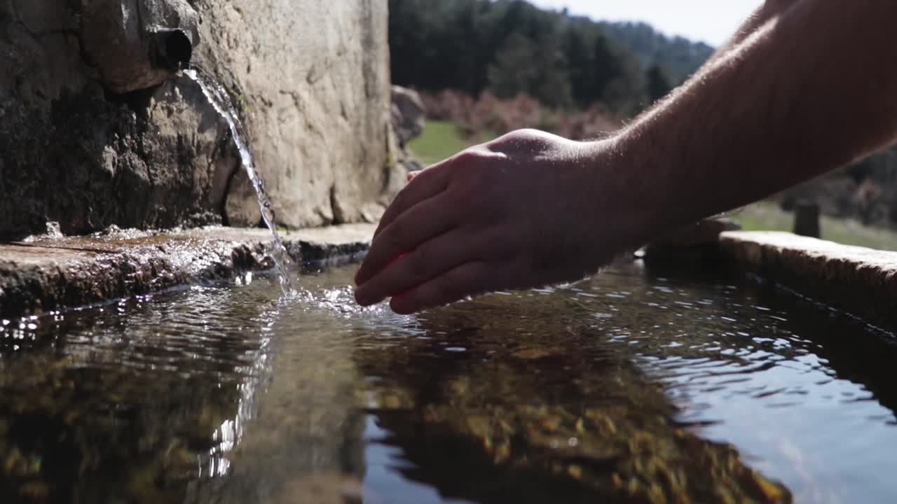 Natural stream of fresh water on a mountain.