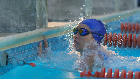 Female-swimmer-disappointed-and-splashes-water-in-pool-4k