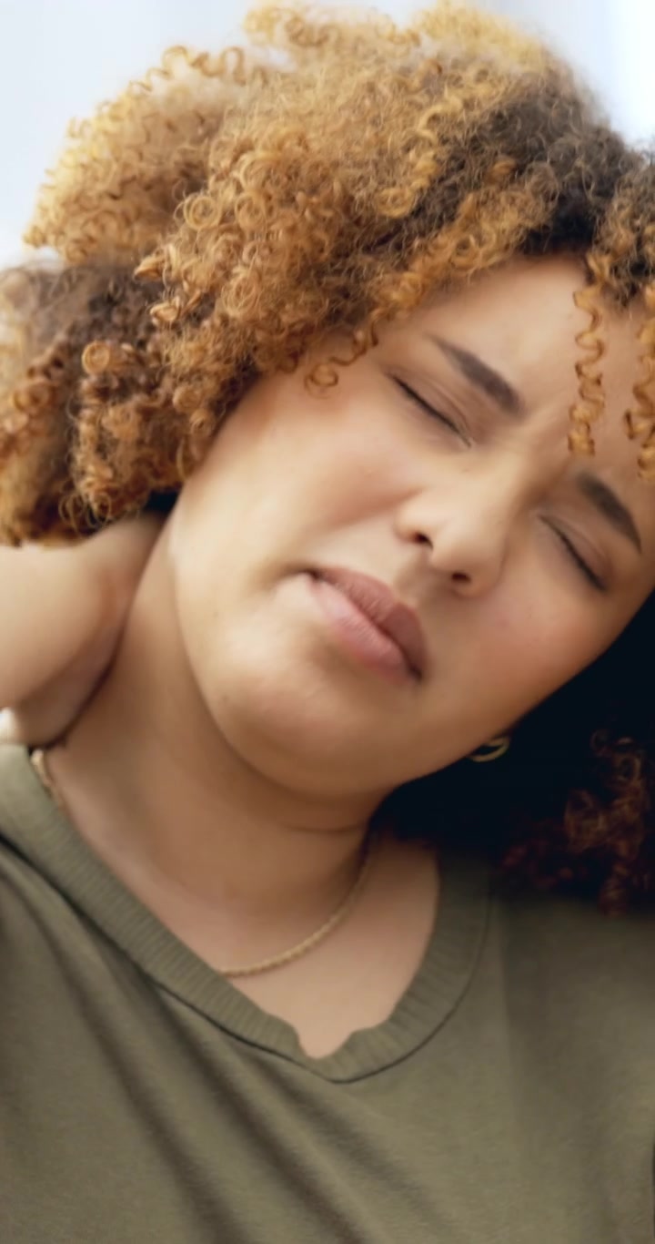 Young Woman Suffering From Neck Pain and Muscle Tension
