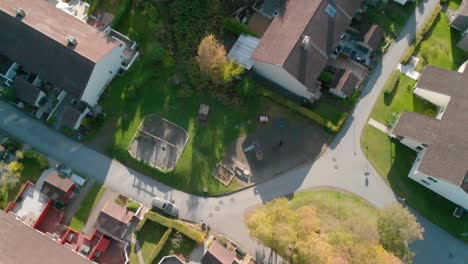 looking down over suburbia, houses and backyards