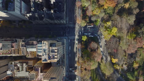 Aerial-birds-eye-overhead-top-down-view-of-buildings-along-Central-park.-Majestic-Apartments-building.-Manhattan,-New-York-City,-USA