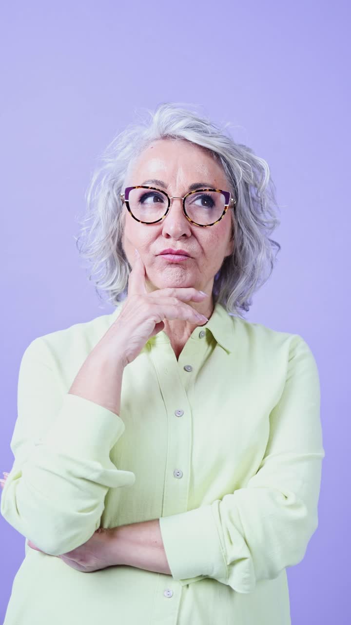 Mature Woman Thinking and Looking Up