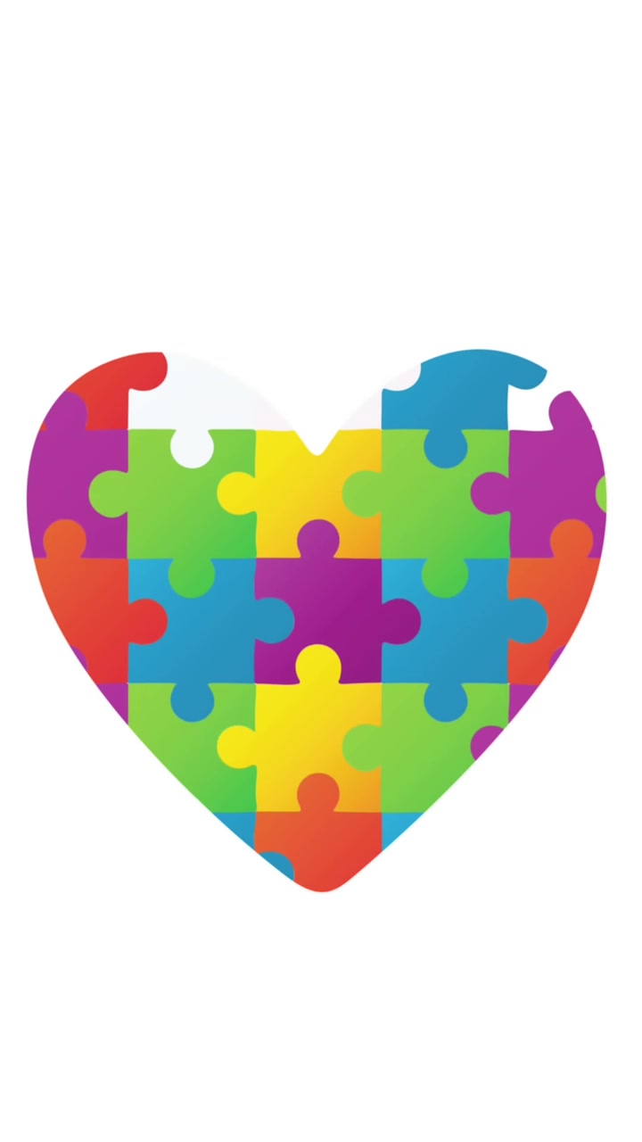 Animazione di pezzi di puzzle colorati e un cuore per il mese della consapevolezza sull'autismo