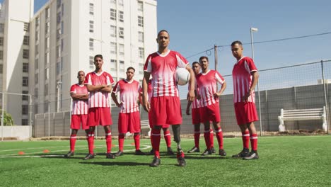 soccer players standing on field