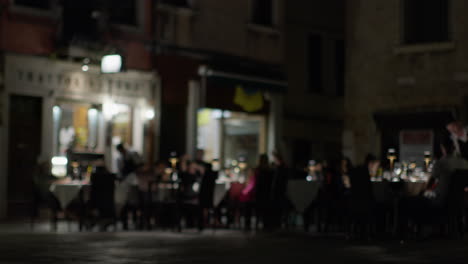 romantic night dinner at an outdoor restaurant in venice