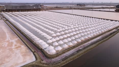 aerial drone shot of sea salt in phetchaburi, thailand