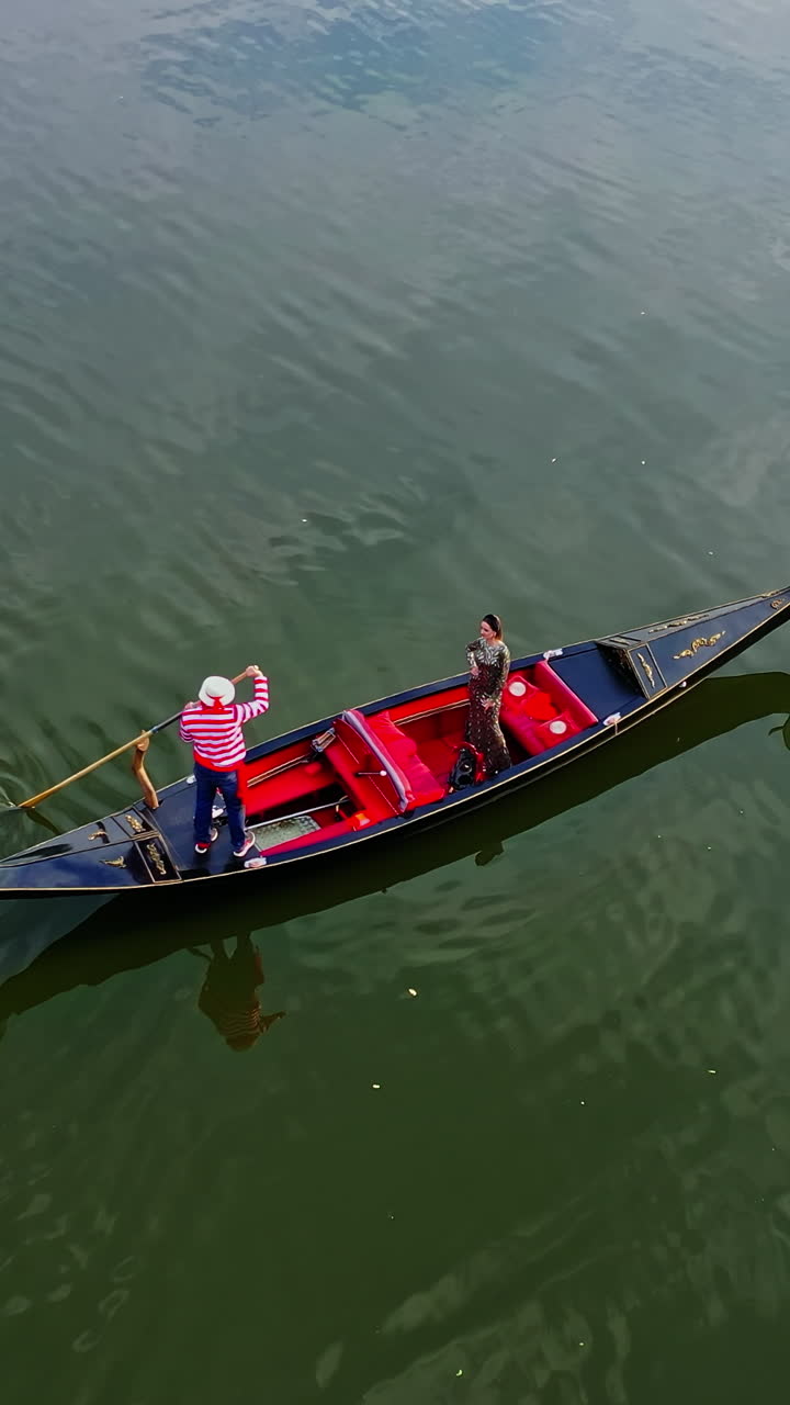 Gondola In Romantic City. Gondolas with tourists carrying along river