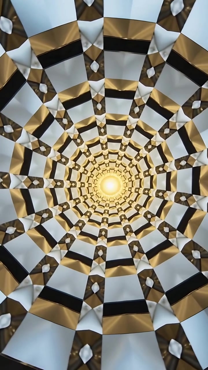 Video verticale: Lampada radiale rotante che si sposta mentre immagini vengono proiettate sul soffitto con specchi dal nucleo luminoso.