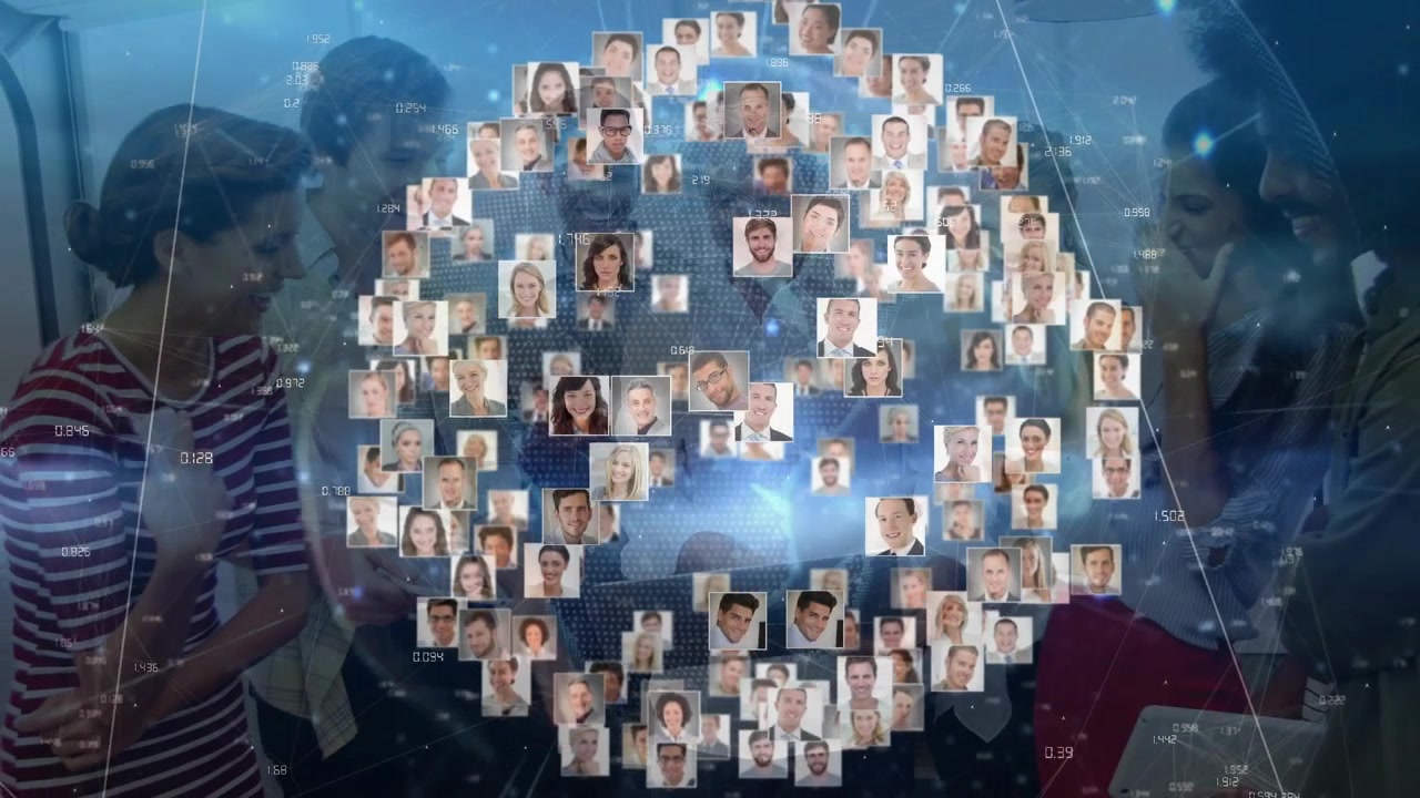 Three colleagues starting data presentation at table creating holographic sphere filling with icons