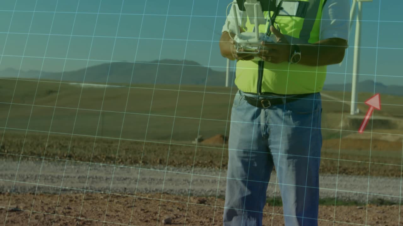 Operador de drone elevando o controle e ajustando o voo do drone e o gráfico de rastreamento sobre turbinas eólicas.