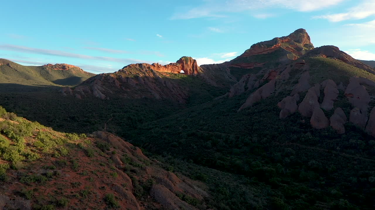 Hole in mountain Track in Drone shot in slow motion