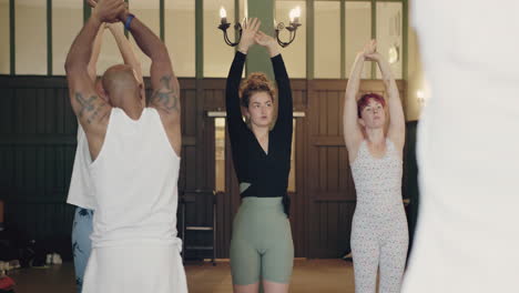 yoga class with people stretching