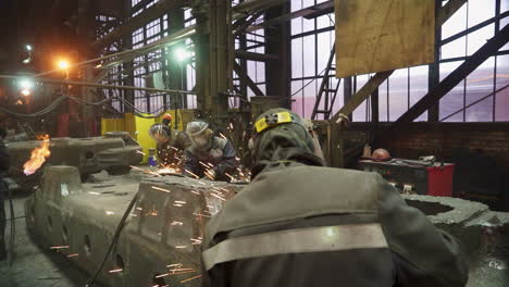 metal workers in a factory