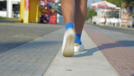 Senior-woman-speed-walking-outdoor