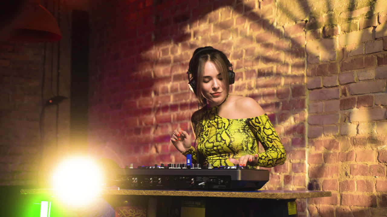 Woman djing at the disco