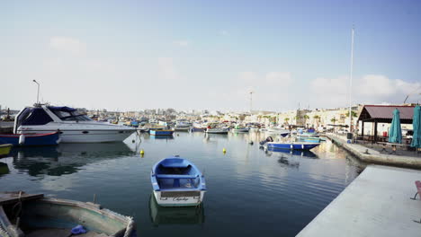 overflooded fishing boats fleet docked at marsaxlokk malta