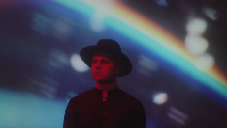 catholic priest in neon room