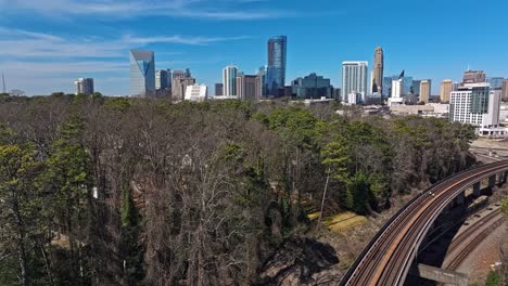 high rails in suburb forest of atlanta town in sunlight